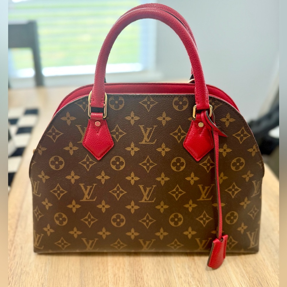 Louis Vuitton Brown Monogram Canvas and Leather Alma B'N'B w/cherry red details.